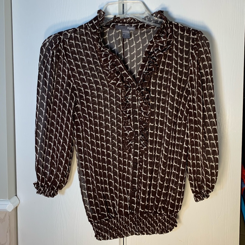 brown and white blouse